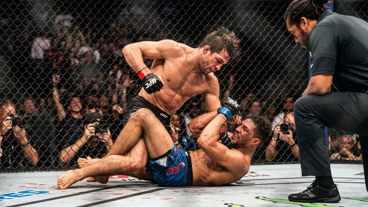 DOS ANJOS UPSETS PETTIS AT UFC 185