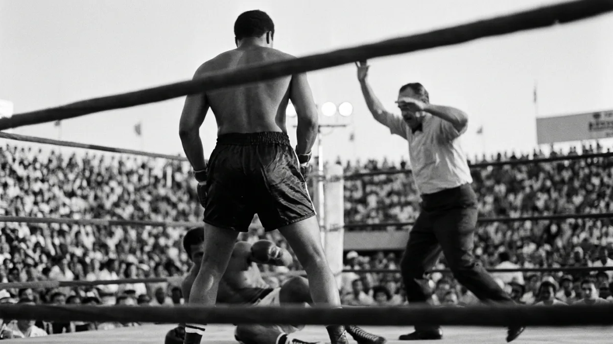Foreman Drops Frazier Six Times in Kingston to Take the 1973 Heavyweight Title