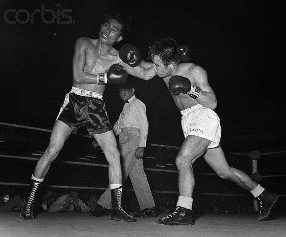 Fighting Harada punching Pone Kingpetch in a 1962 title fight