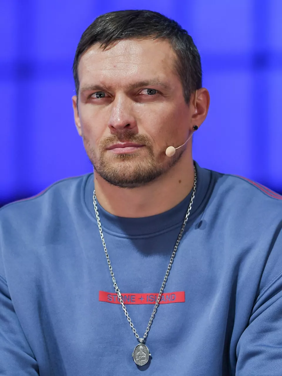 Oleksandr Usyk speaking on stage at Web Summit 2022