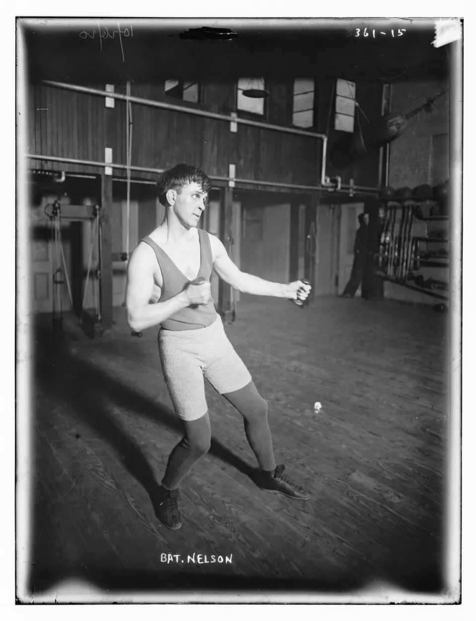 Battling Nelson posing with fists raised