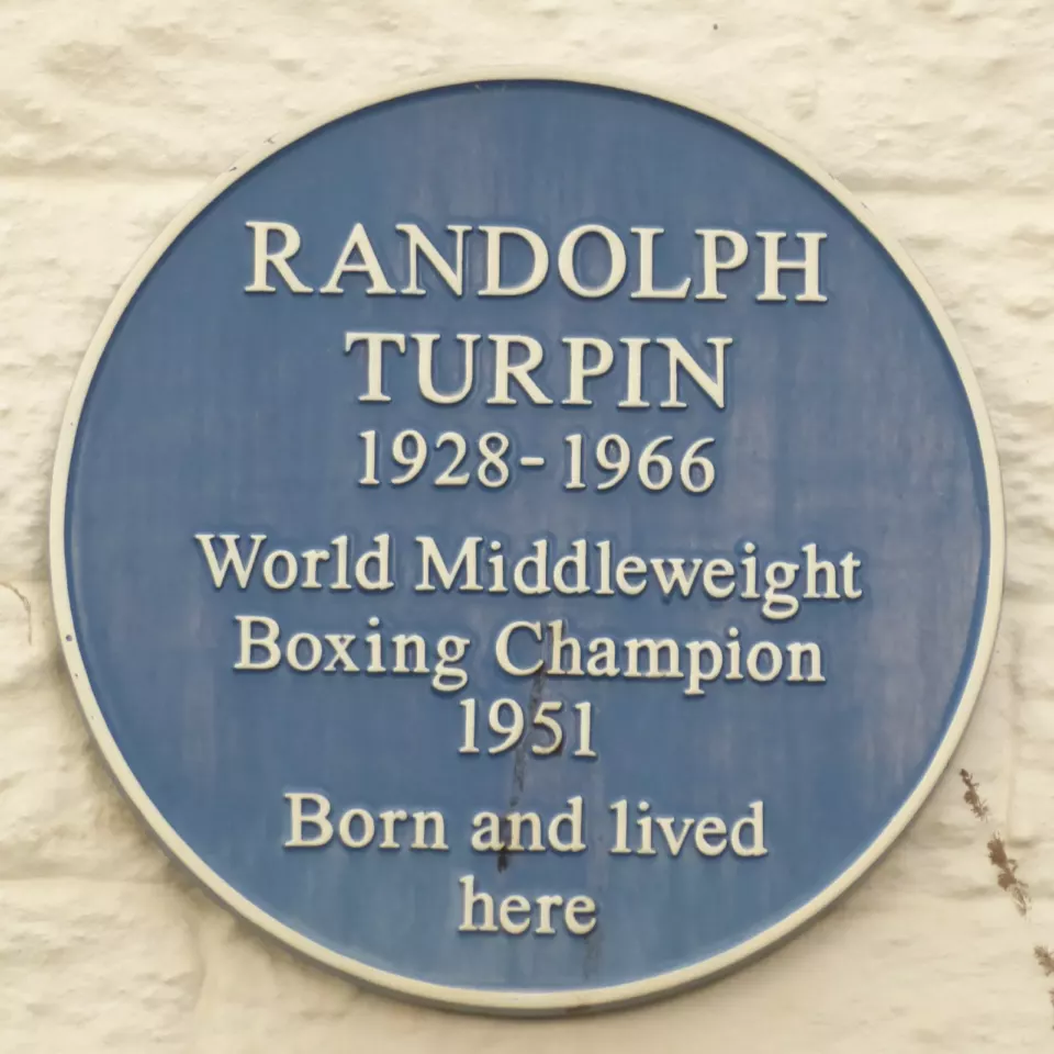 Blue plaque commemorating boxer Randolph Turpin in Leamington Spa
