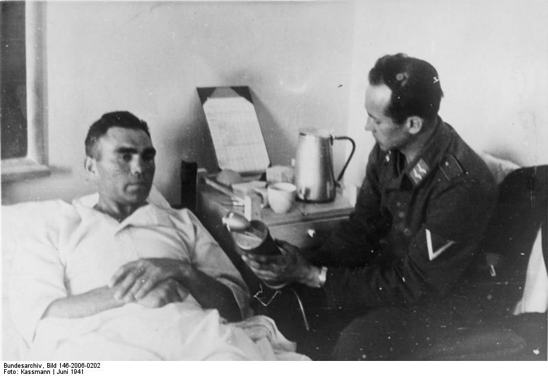 Max Schmeling lying in a military hospital bed in 1941