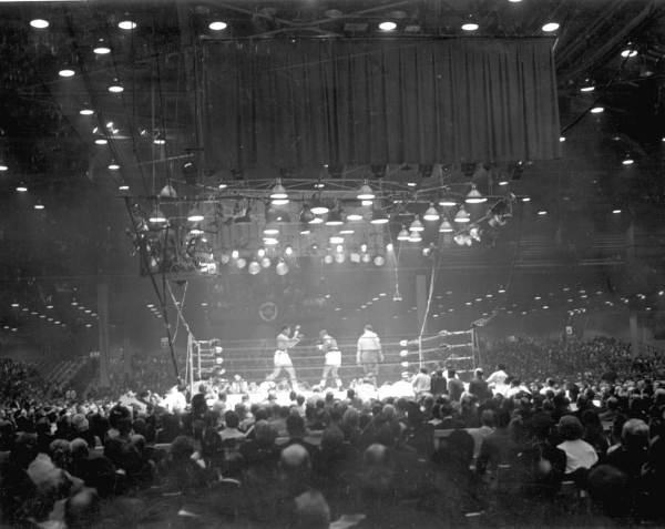 Two heavyweights in the ring during the 1964 Clay-Liston title fight in Miami Beach