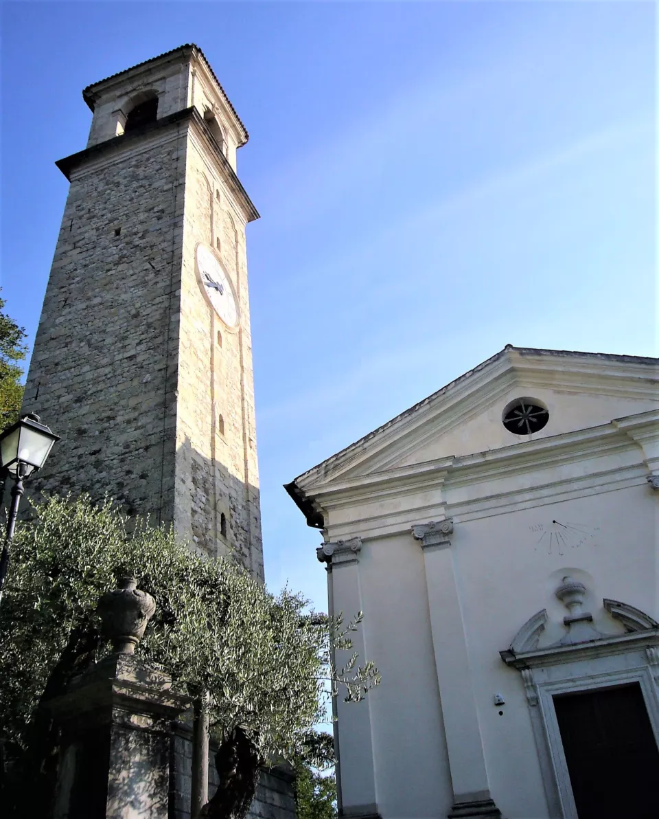 Bell tower and parish church in the village of Sequals, Italy