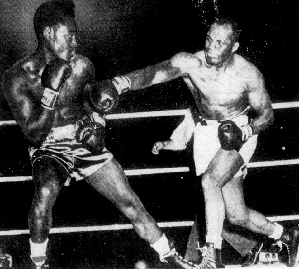 Ezzard Charles and Jersey Joe Walcott in a 1949 boxing match