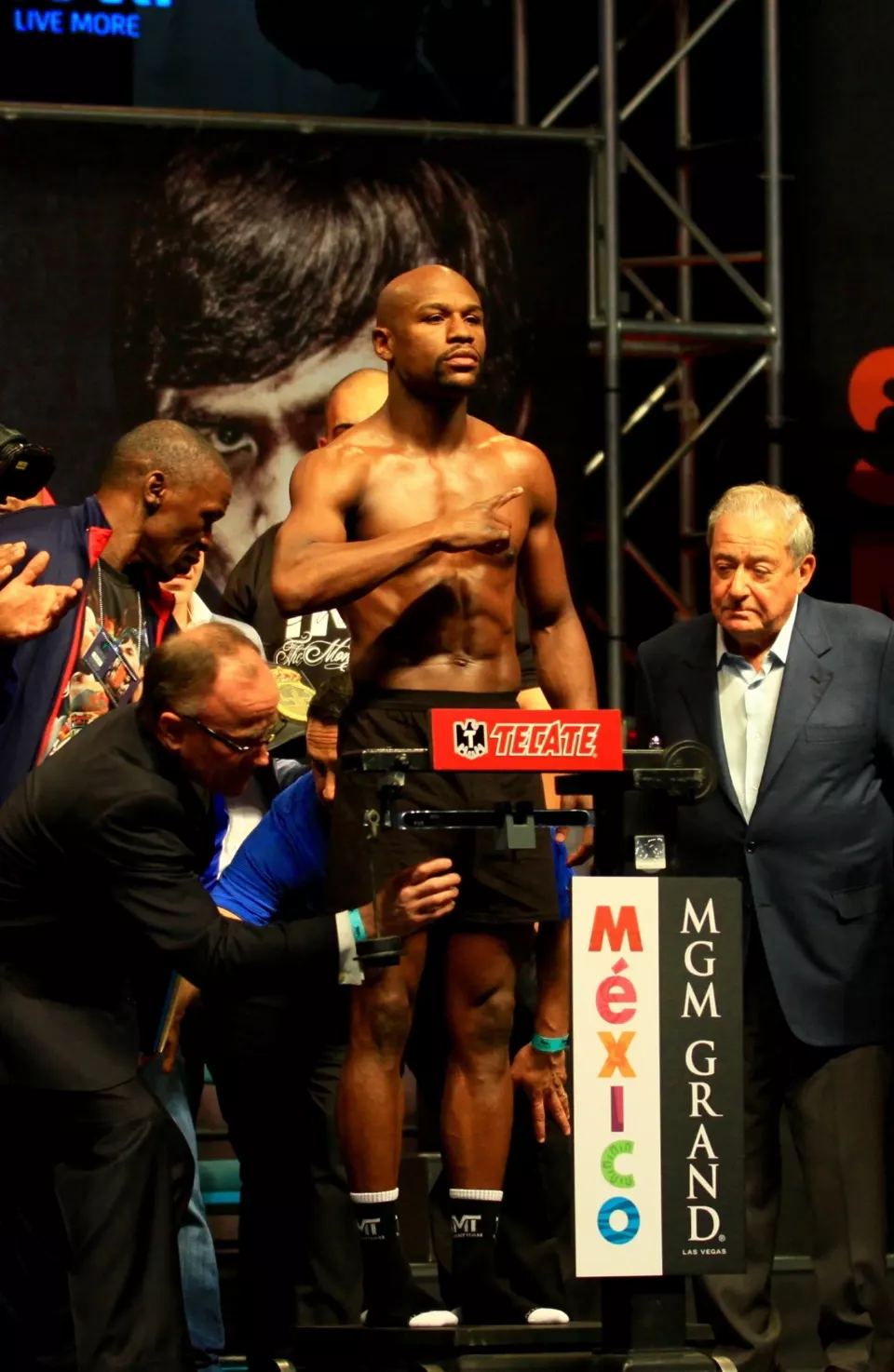 Floyd Mayweather Jr. on the scale at a weigh-in