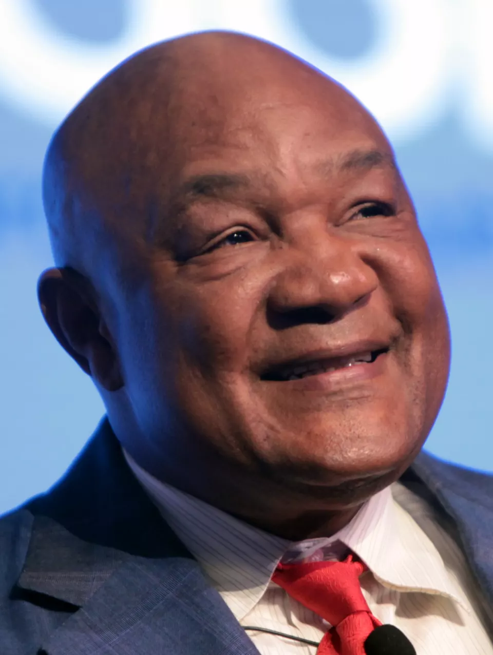 An older George Foreman smiling at a 2016 event
