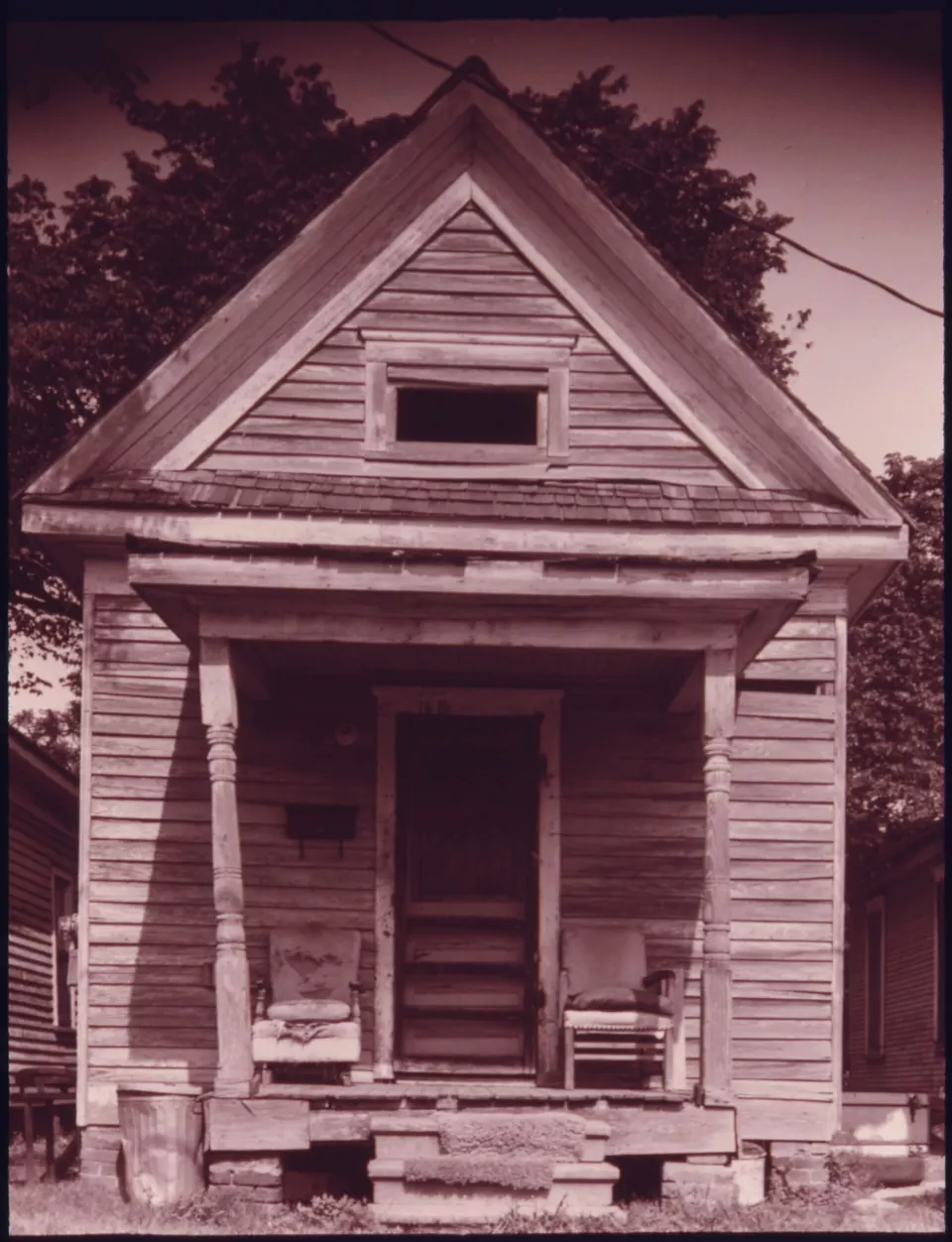 Black-and-white photo of a wooden house in Houston's Fifth Ward