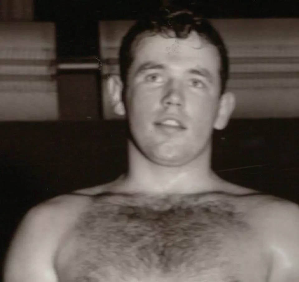 Black-and-white photo of Swedish boxer Ingemar Johansson stripped to the waist