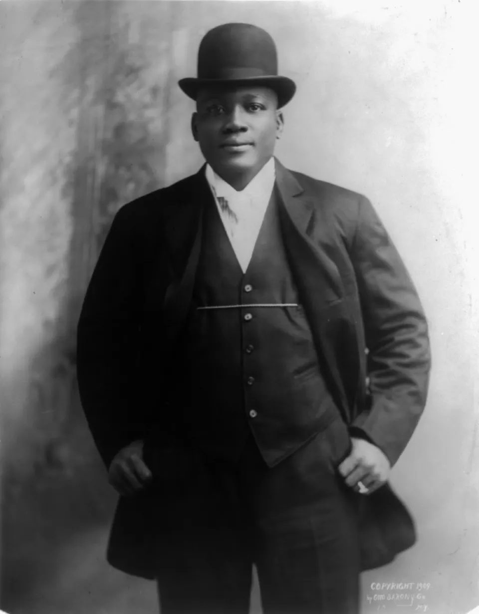 Studio portrait of boxer Jack Johnson, 1909