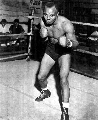 Portrait of young boxer Jersey Joe Walcott in 1937