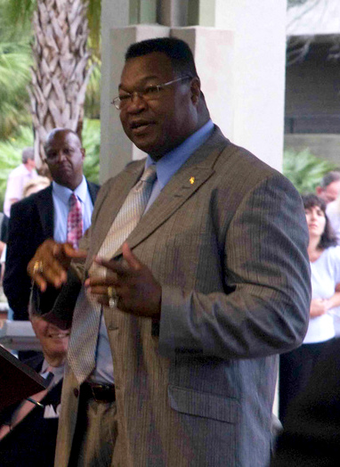Larry Holmes smiling at a public appearance in 2010
