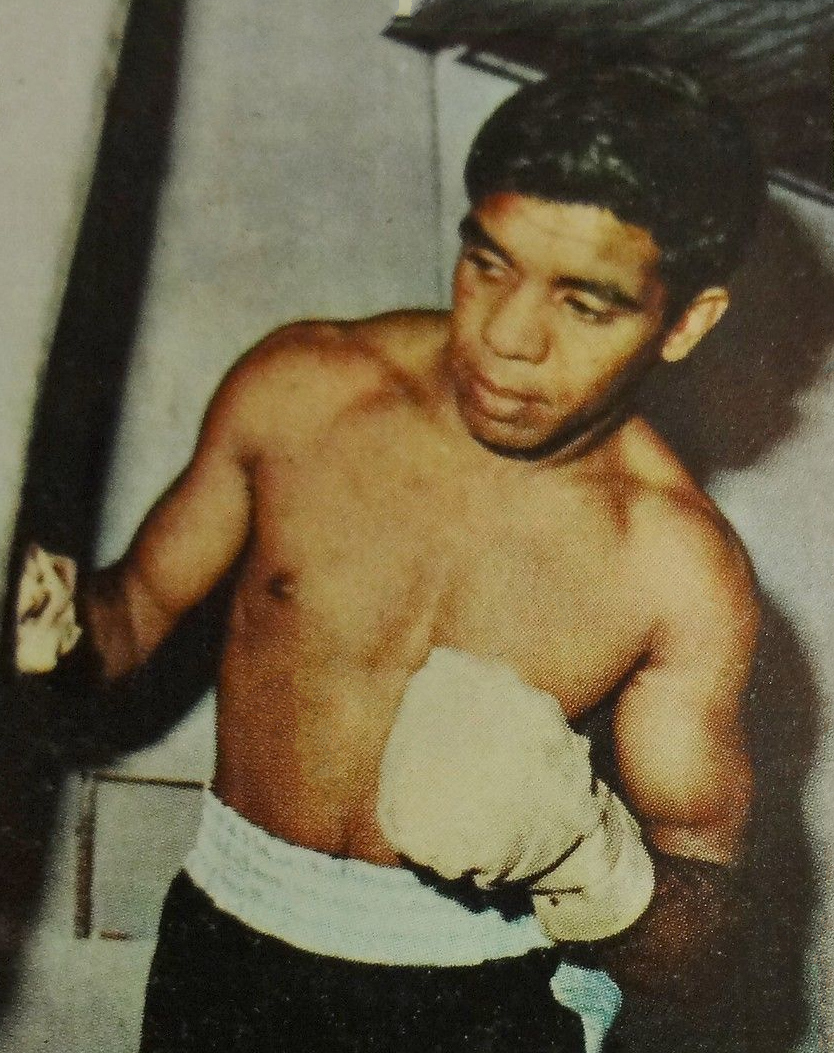 Black-and-white portrait of Australian bantamweight champion Lionel Rose in 1968