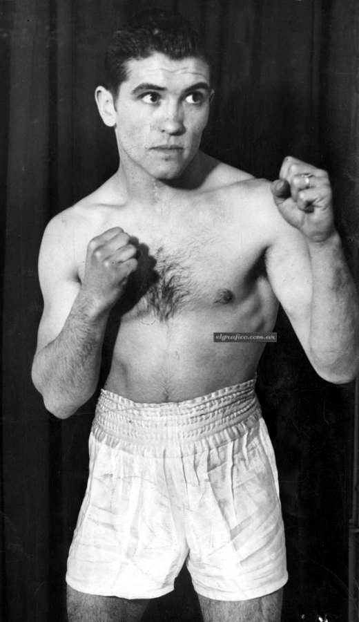 Argentine flyweight boxer Pascual Pérez posing in boxing gear