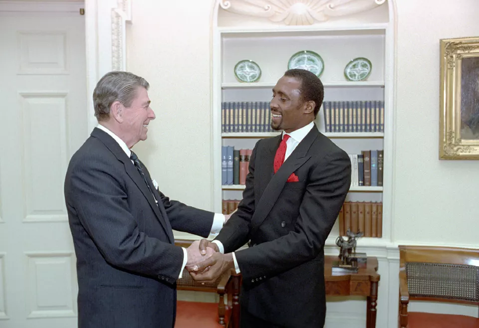 Ronald Reagan standing with boxer Thomas Hearns