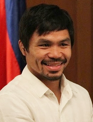 Manny Pacquiao in a suit during a visit to Malacañang Palace
