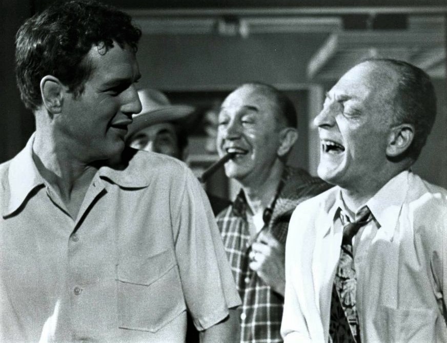 Paul Newman with two co-stars in a still from the 1956 film Somebody Up There Likes Me