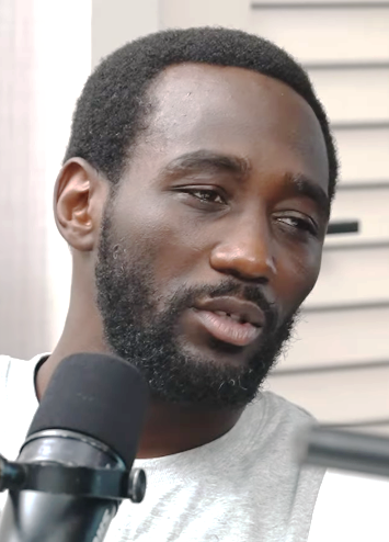 Terence Crawford seated during a podcast interview