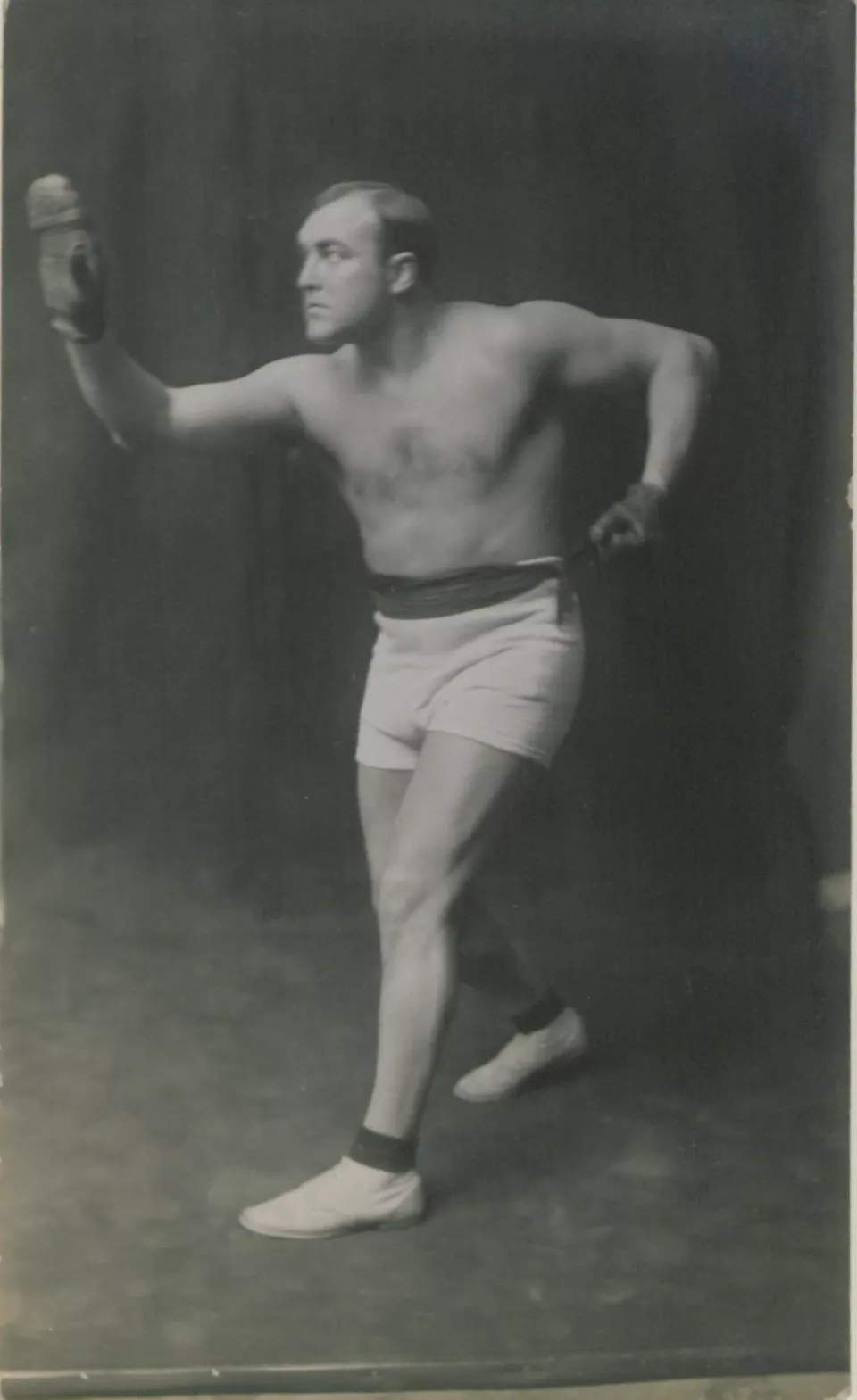 Portrait photograph of Tommy Burns in 1912