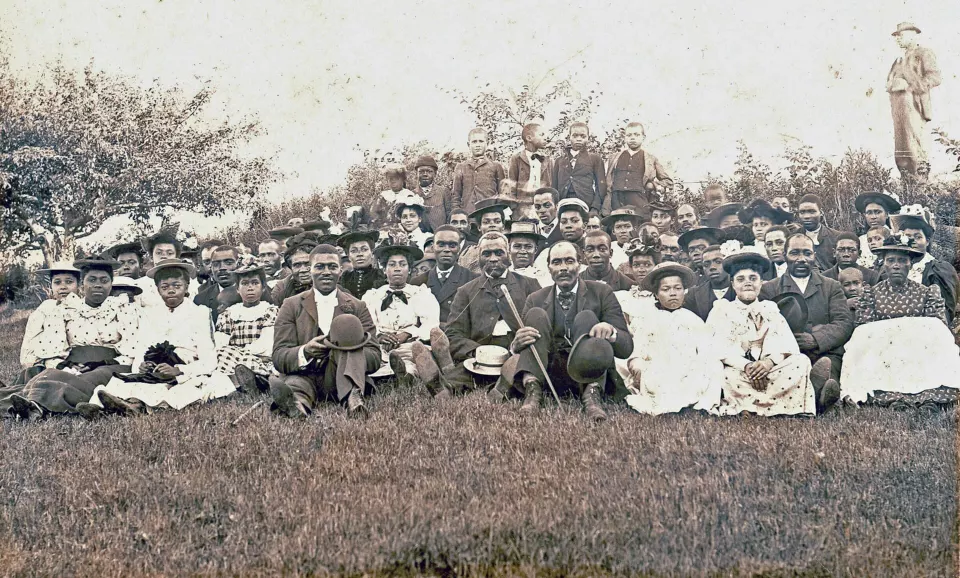Old photograph of a church congregation in formal dress at Weymouth Falls, Nova Scotia